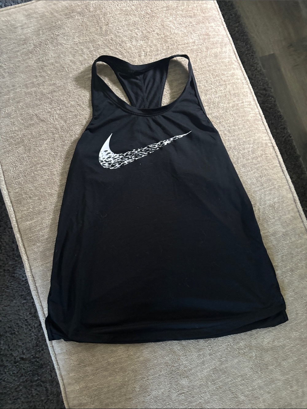Nike Black Racerback Tank with White Patterned Swoosh